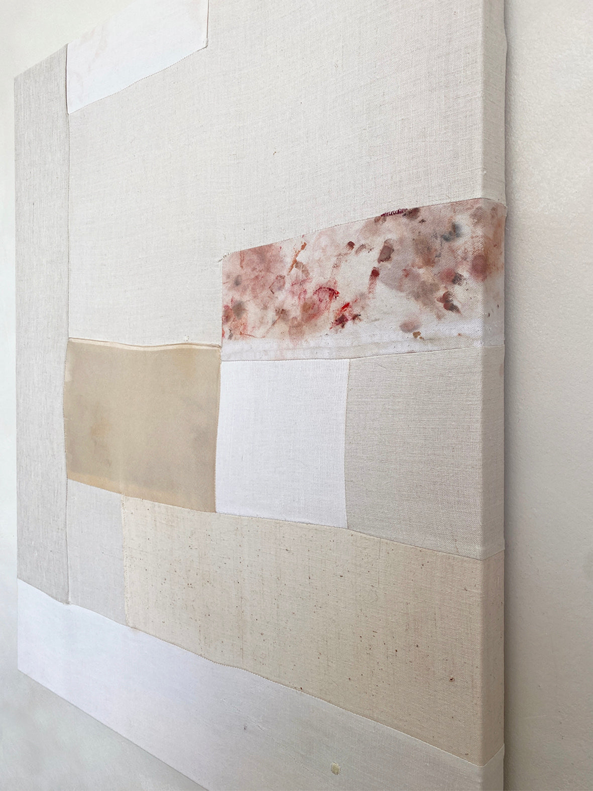 an original artwork by alexia gilbert featuring reclaimed vintage fabrics and abstract painterly elements