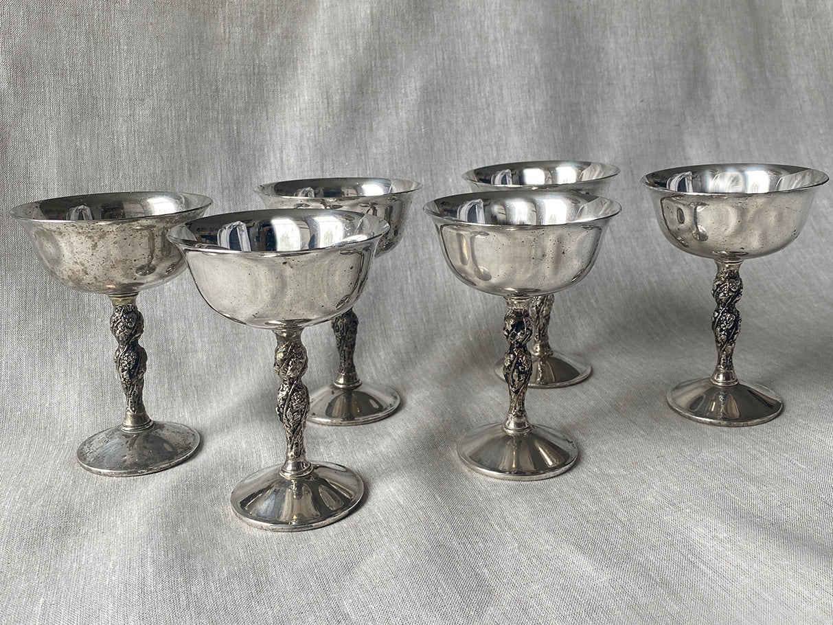 a set of six mid century Spanish silver goblets with engraved twist stems