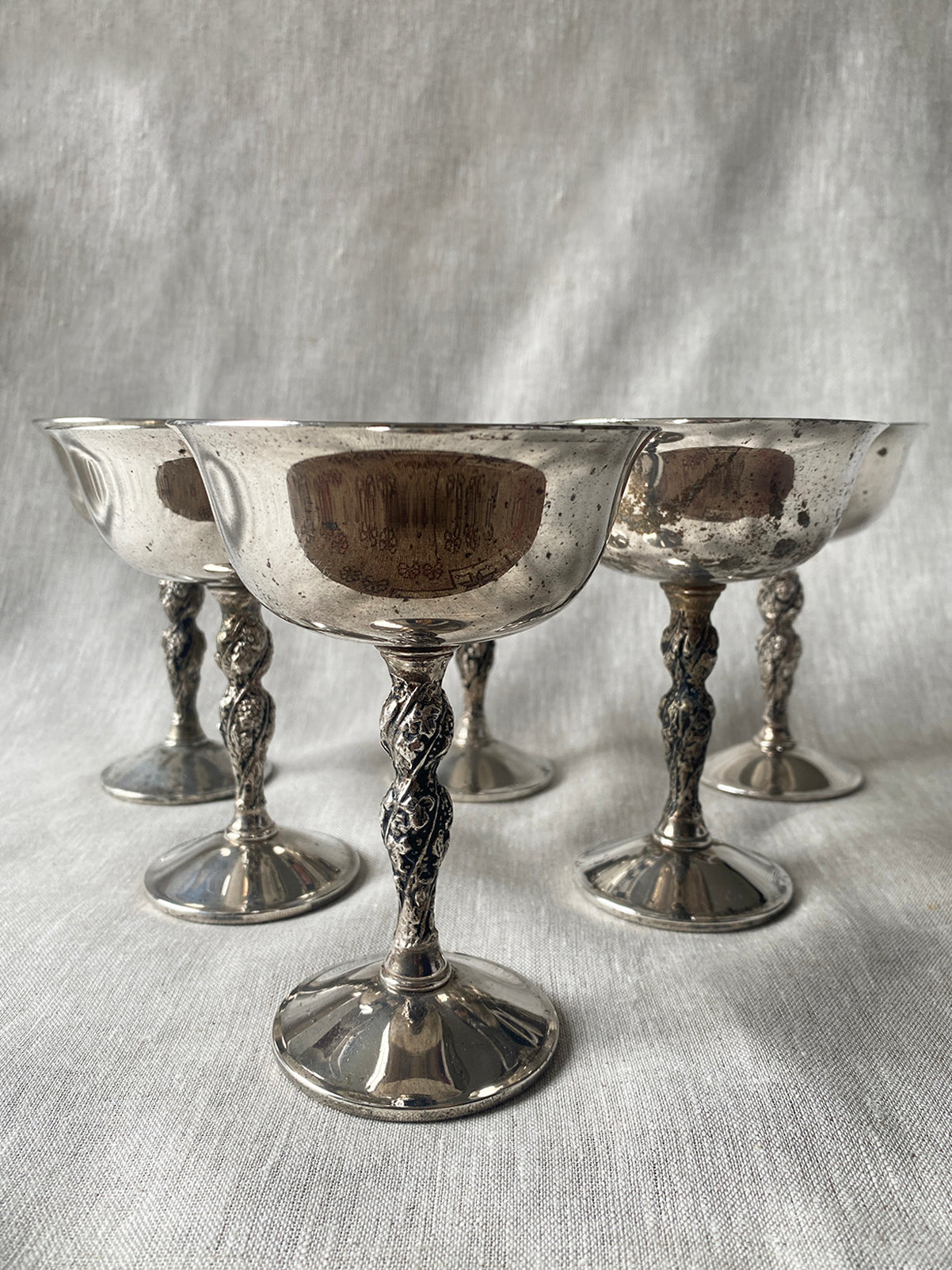 a set of six mid century Spanish silver goblets with engraved twist stems