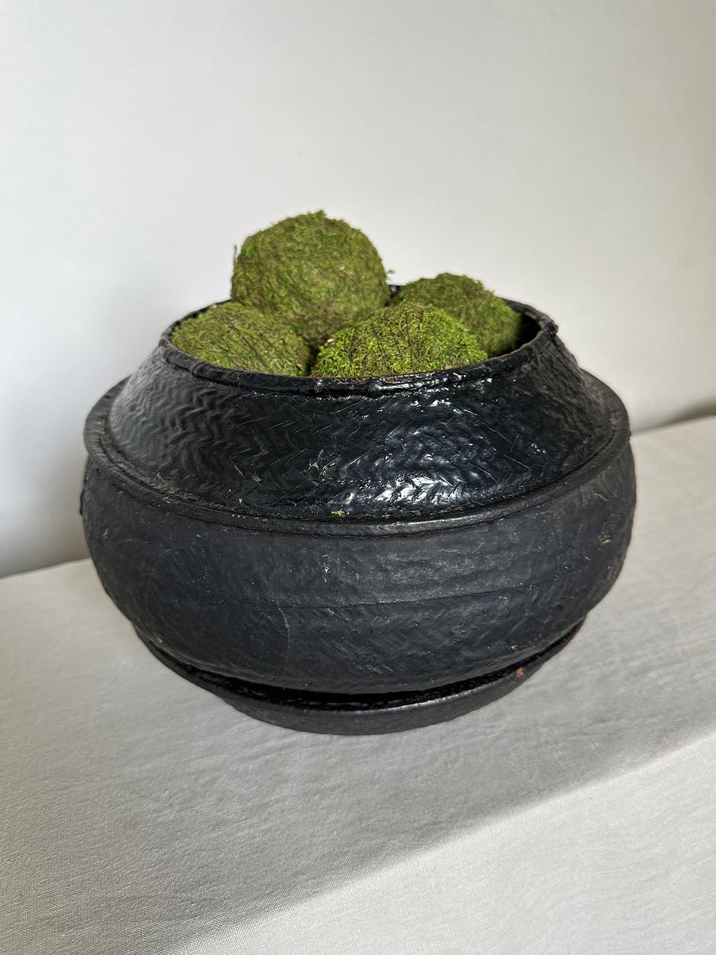 a beautiful hand-woven lidded basket with a primitive, wabi-sabi feel