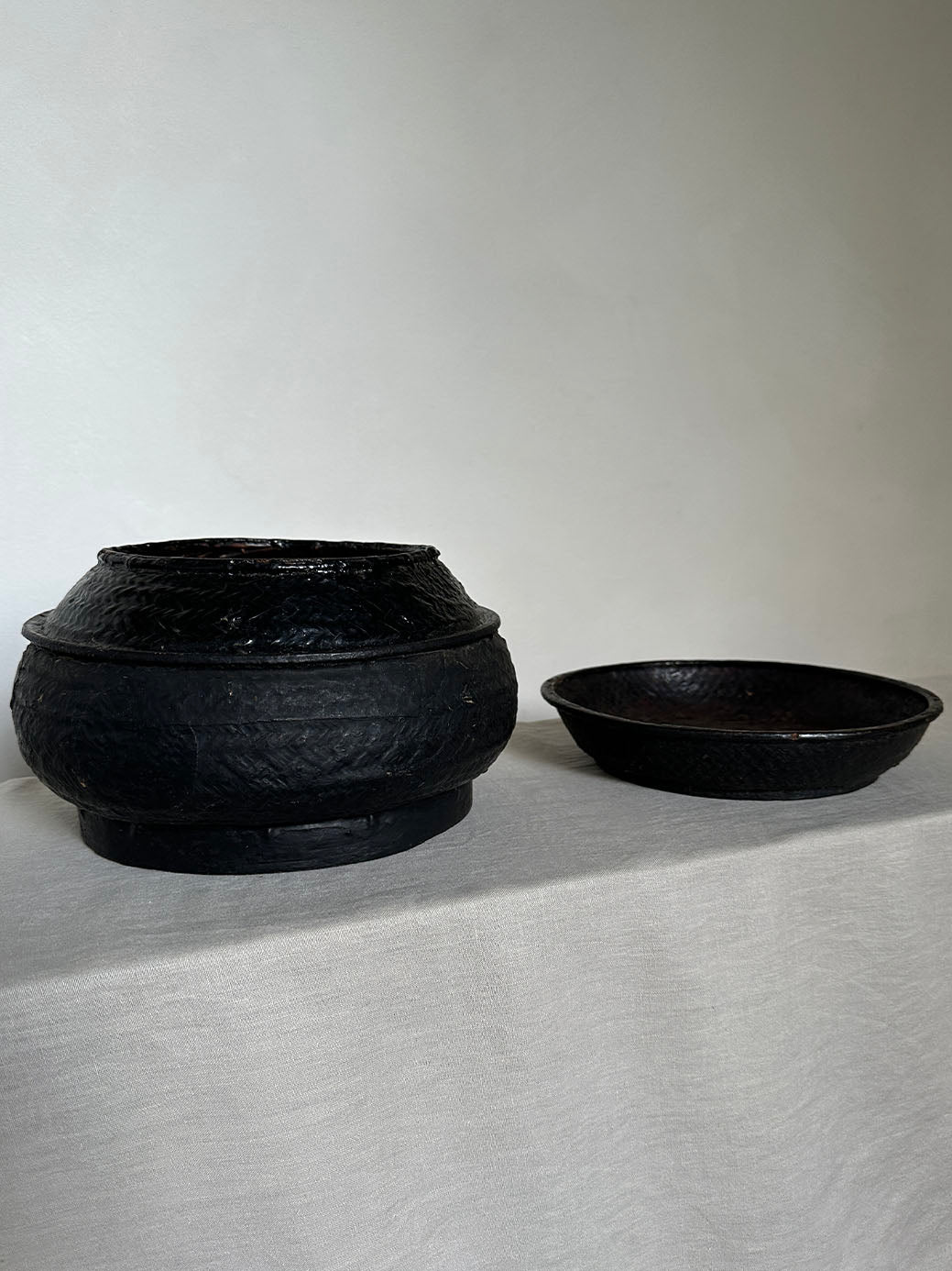 a beautiful hand-woven lidded basket with a primitive, wabi-sabi feel