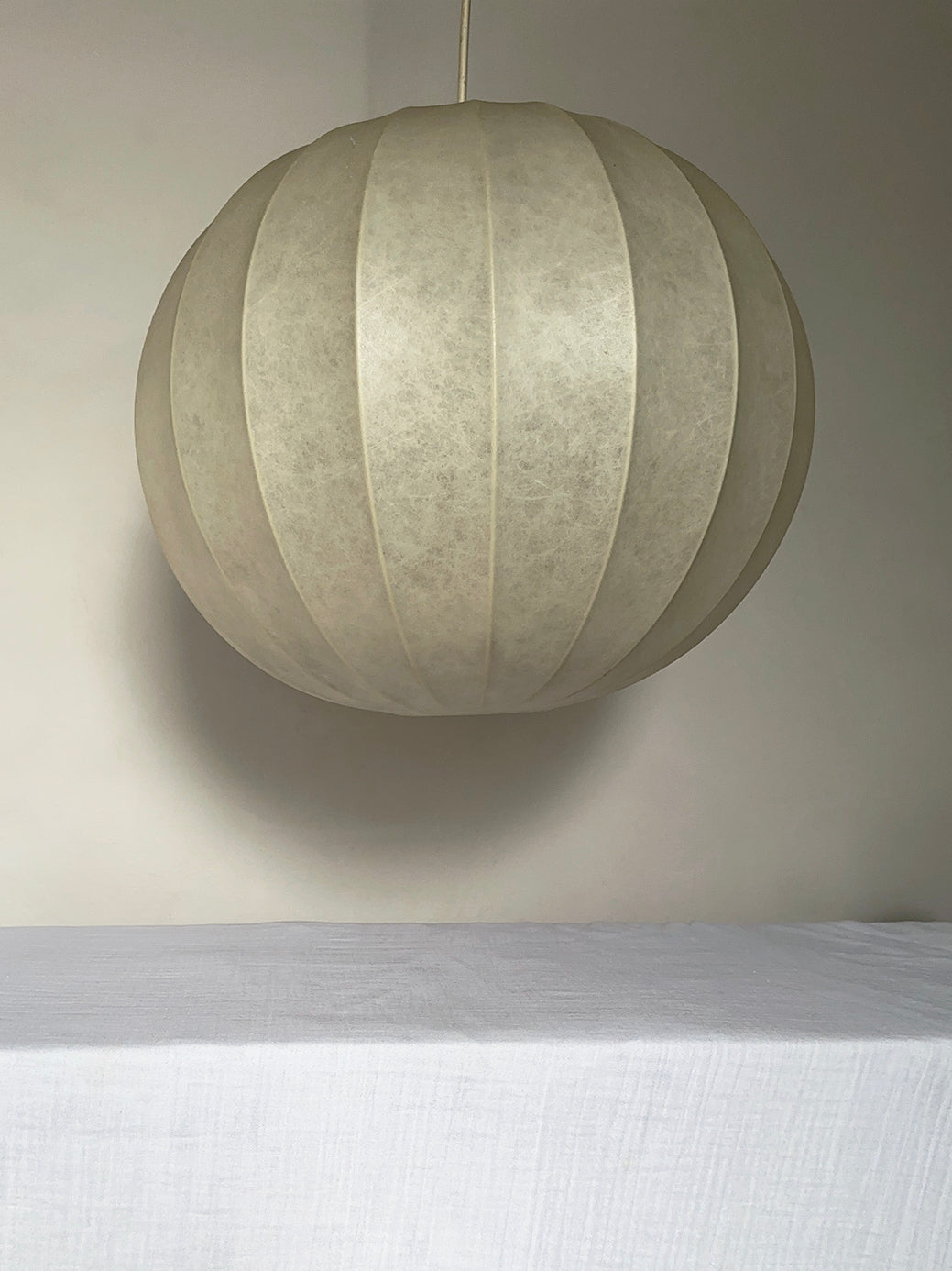 an iconic midcentury modern pendant light designed by Achille Castiglioni, Italy 1960s