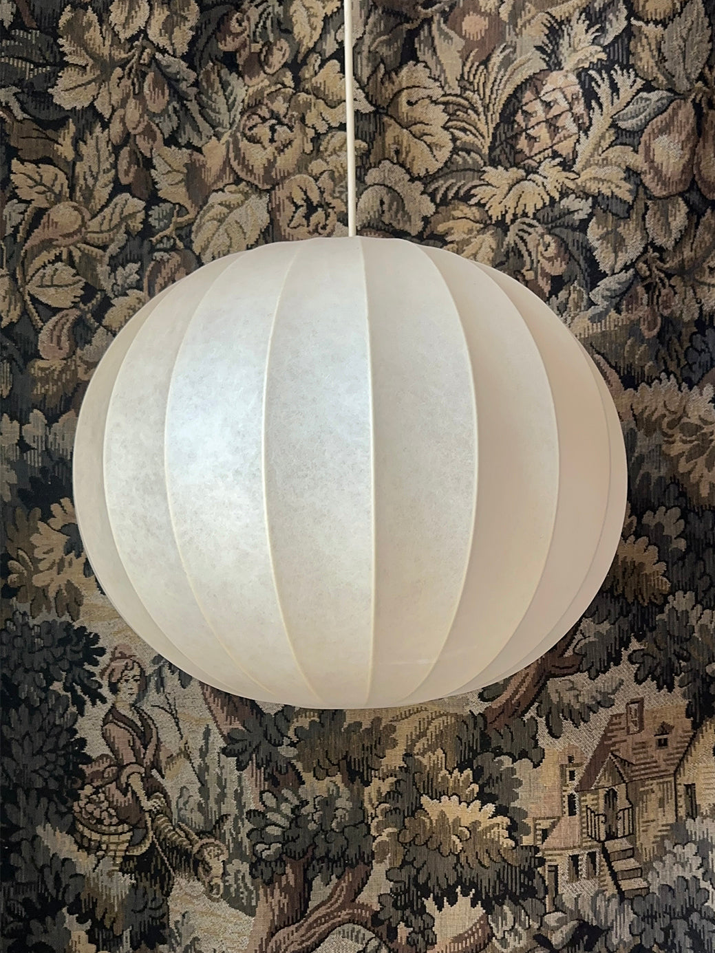 an iconic midcentury modern pendant light designed by Achille Castiglioni, Italy 1960s