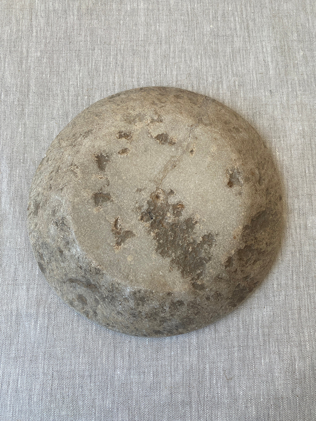 a hand-carved Indian marble bowl with an organic form and texture