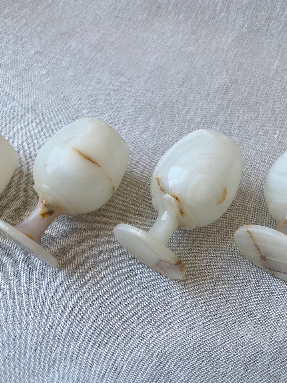 a set of vintage onyx goblets in natural stone marble