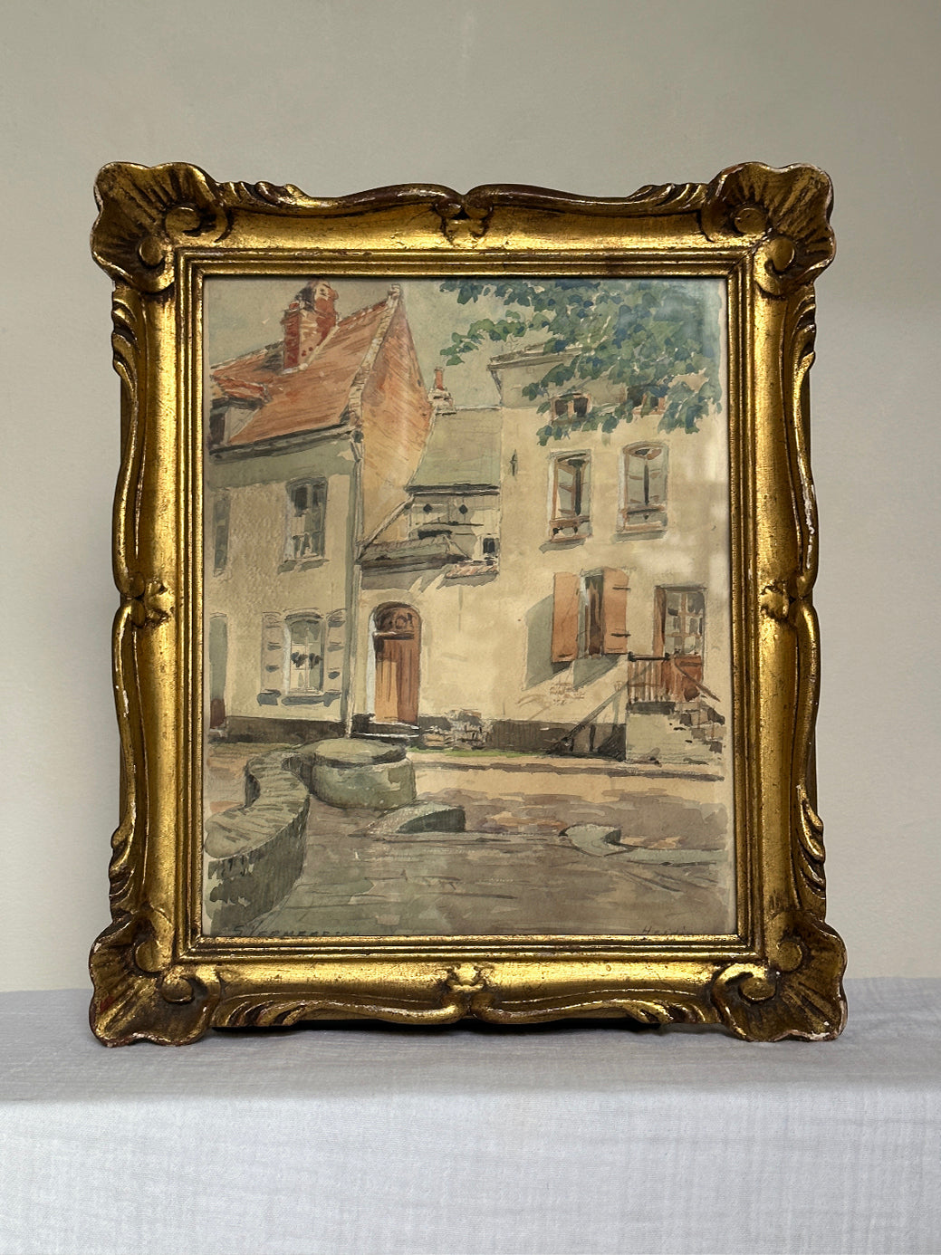 a beautiful watercolour painting in a pastel tones, depicting the historic french town of Hesdin