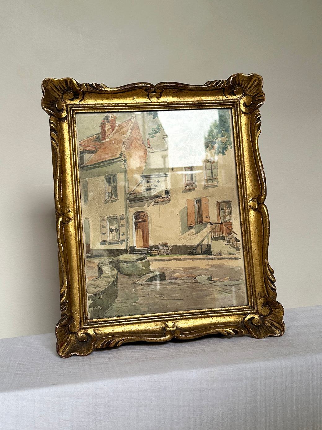 a beautiful watercolour painting in a pastel tones, depicting the historic french town of Hesdin