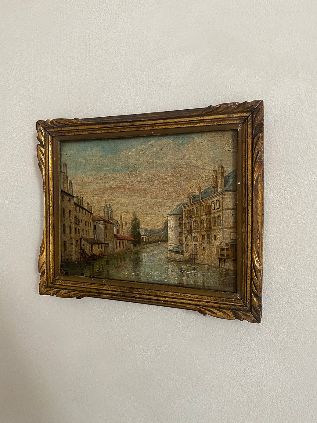 an antique oil painting of the French town Metz, painted by the artist J Hoffmann