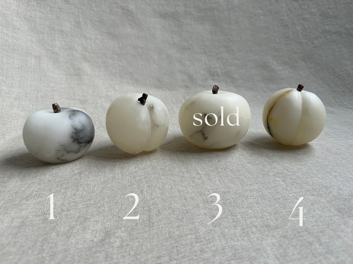 Carved calacatta marble fruit