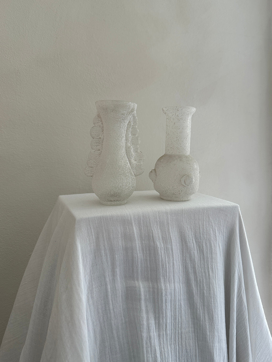 a vintage white vase from the highly celebrated murano scavo collection 