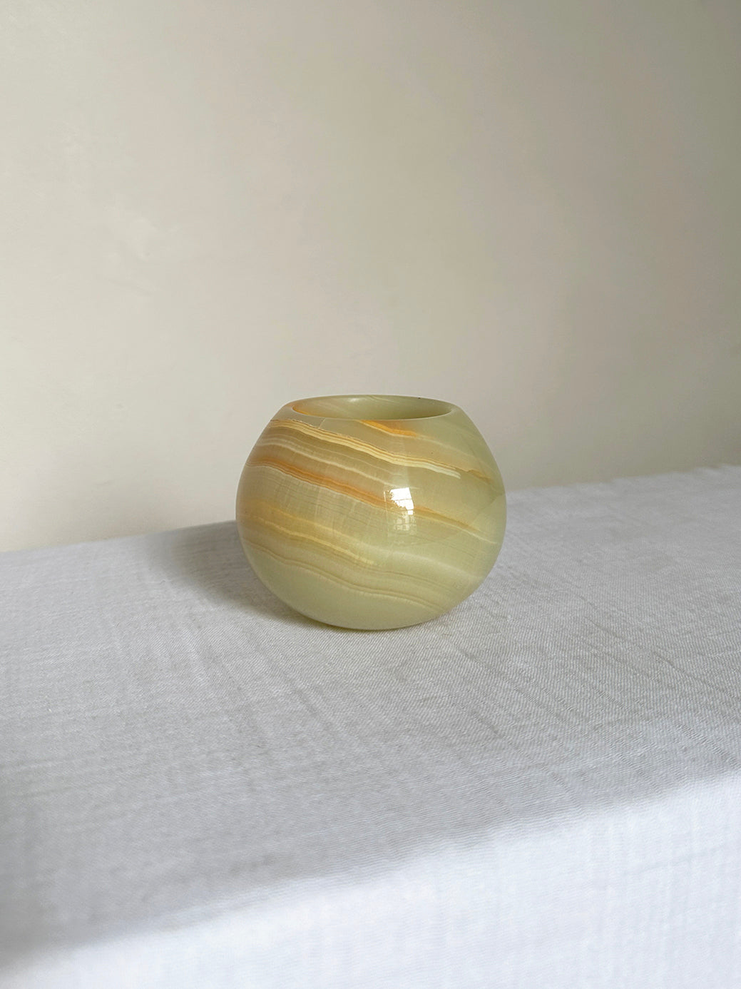 a pretty onyx tea light candle holder in carved onyx stone