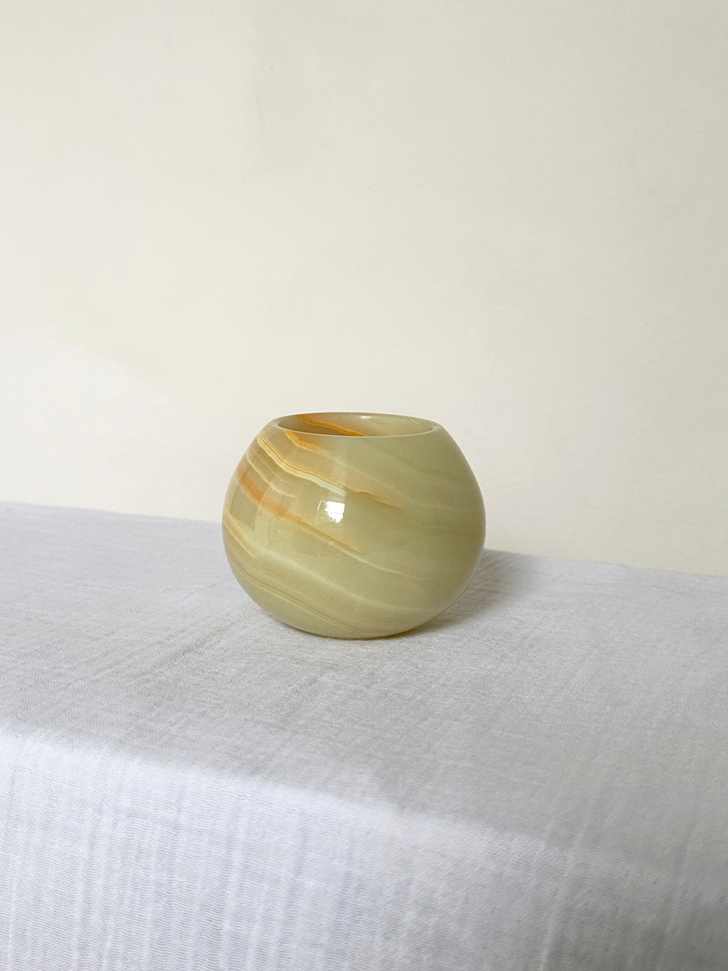 a pretty onyx tea light candle holder in carved onyx stone