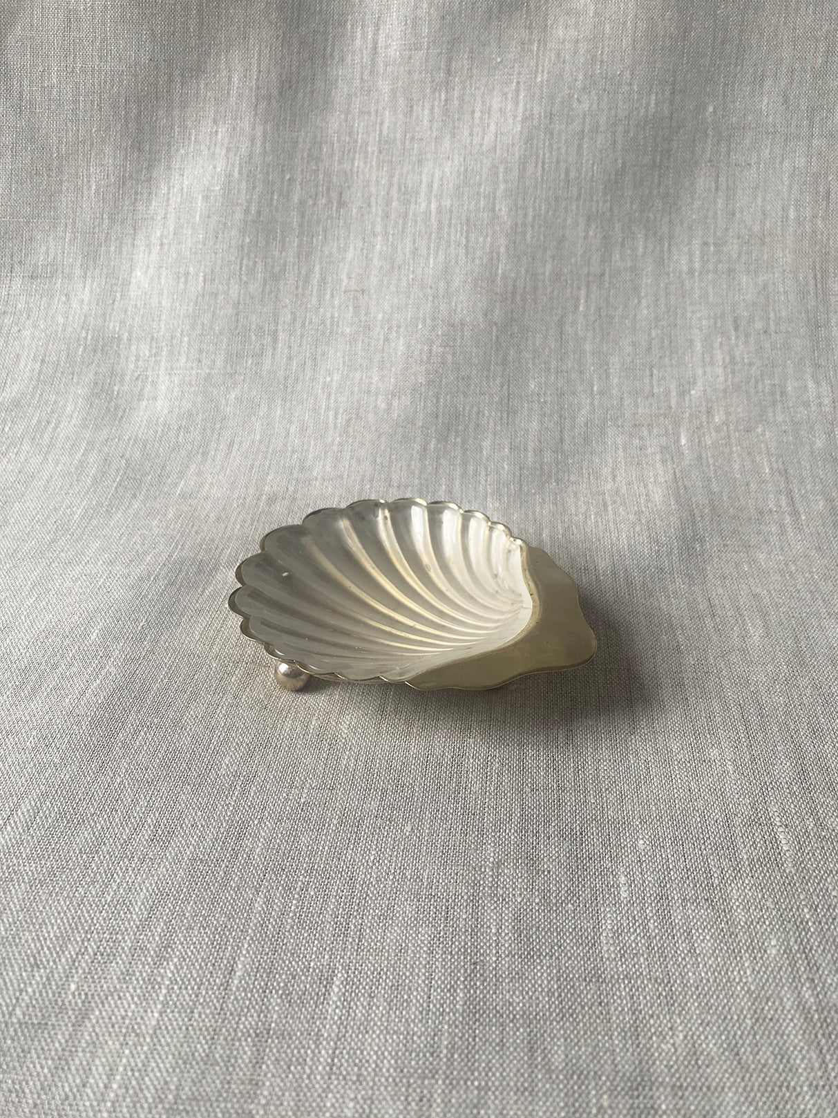 a silver-plated EPNS shell butter/caviar dish with a glass liner