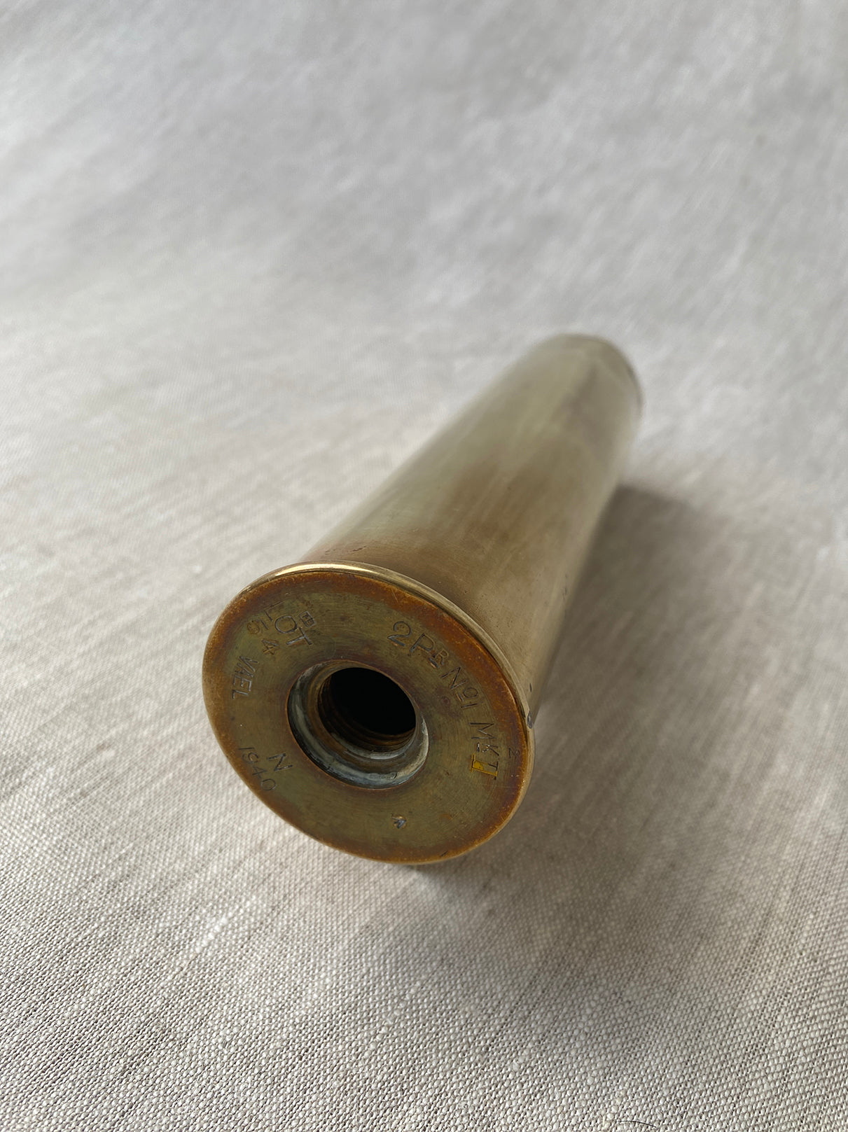 a small brass antique artillery shell 