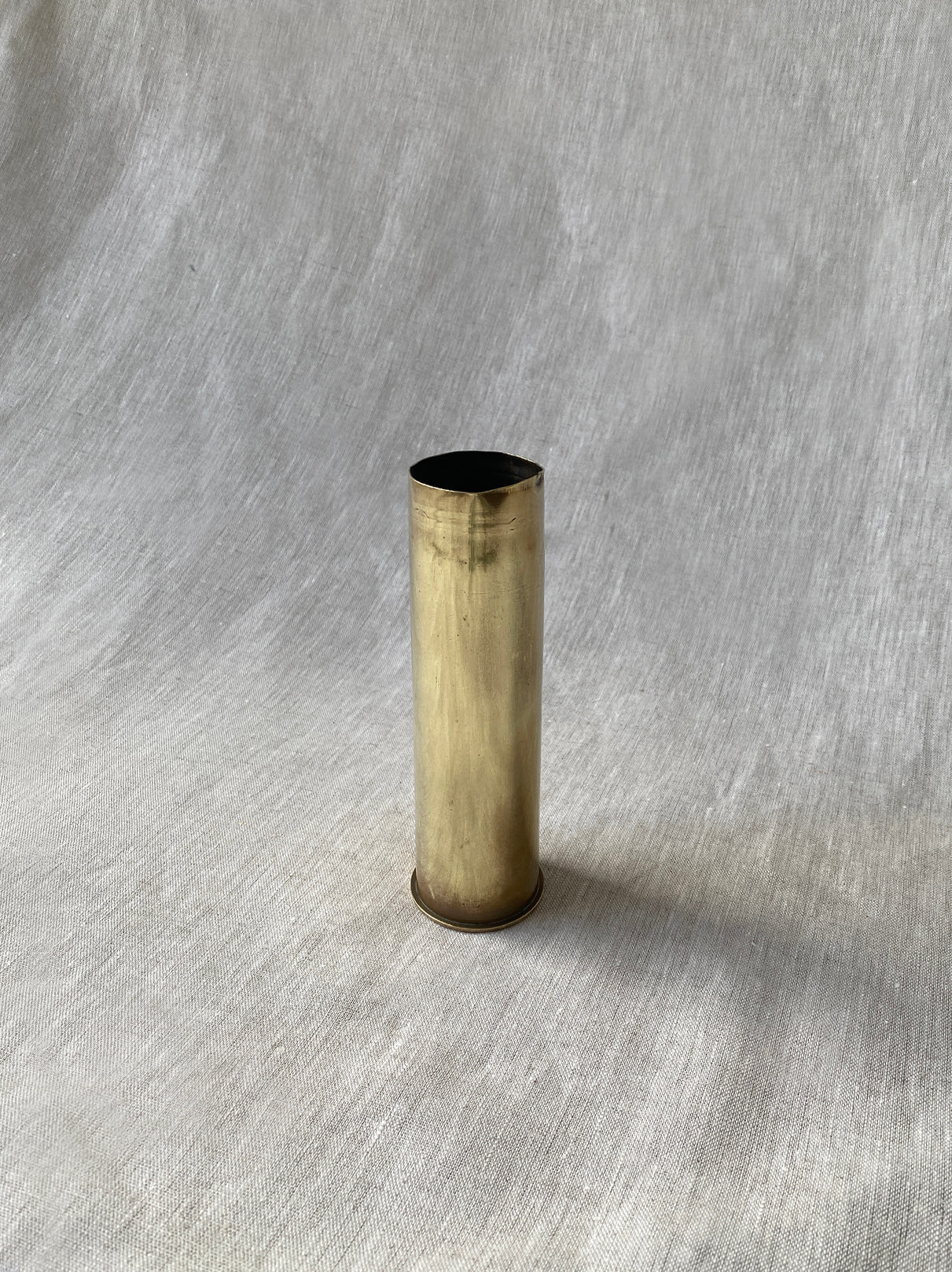 a small brass antique artillery shell 