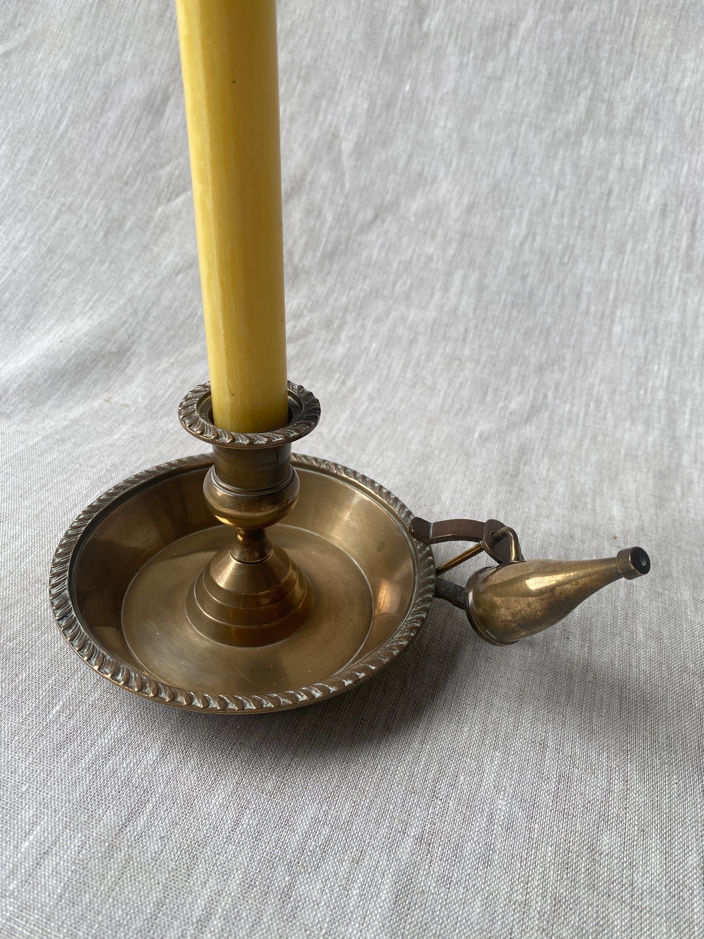 Antique brass chamberstick with snuffer