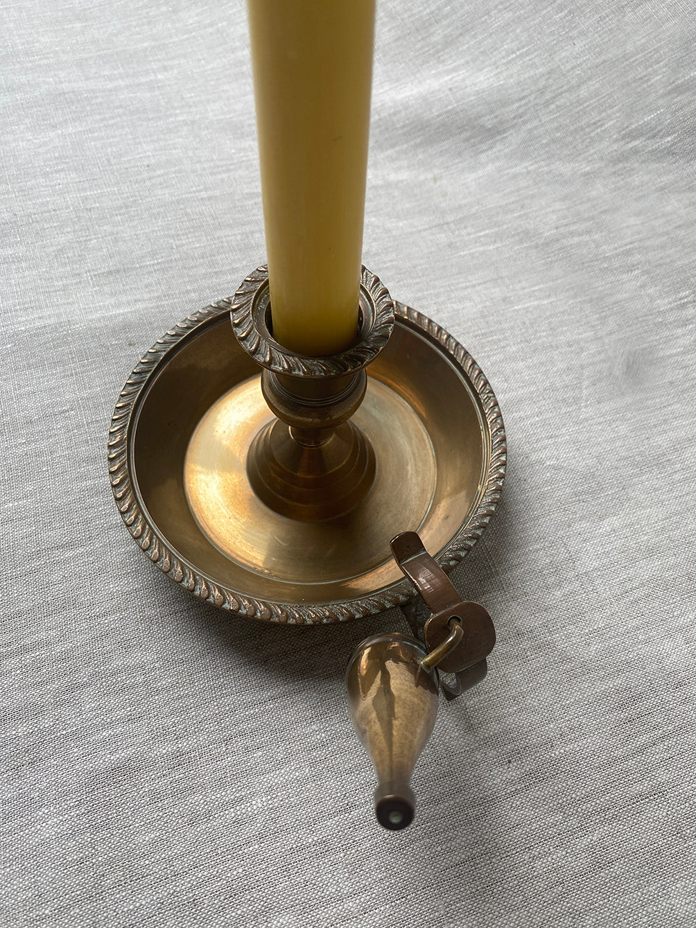 Antique brass chamberstick with snuffer