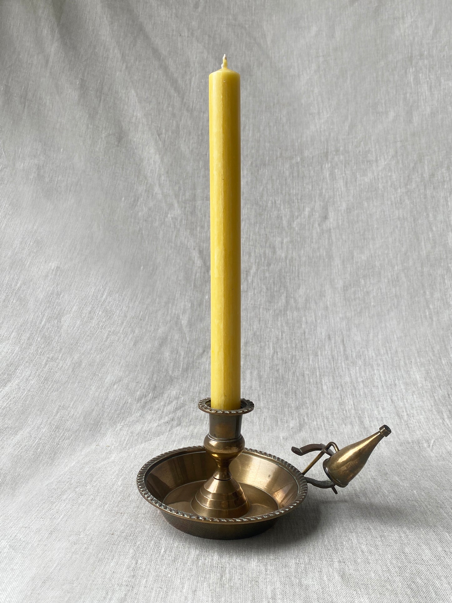 Antique brass chamberstick with snuffer