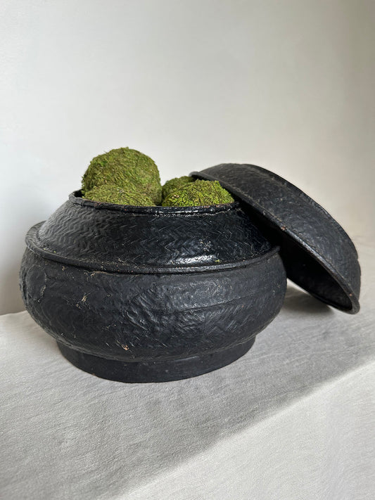 a beautiful hand-woven lidded basket with a primitive, wabi-sabi feel