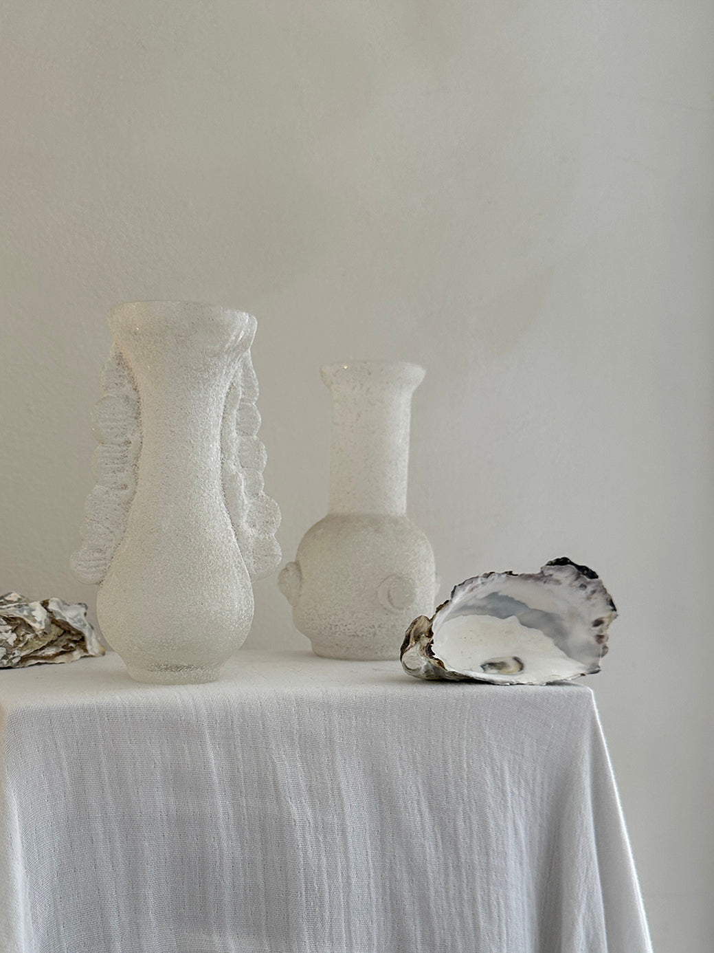 a vintage white vase from the highly celebrated murano scavo collection 