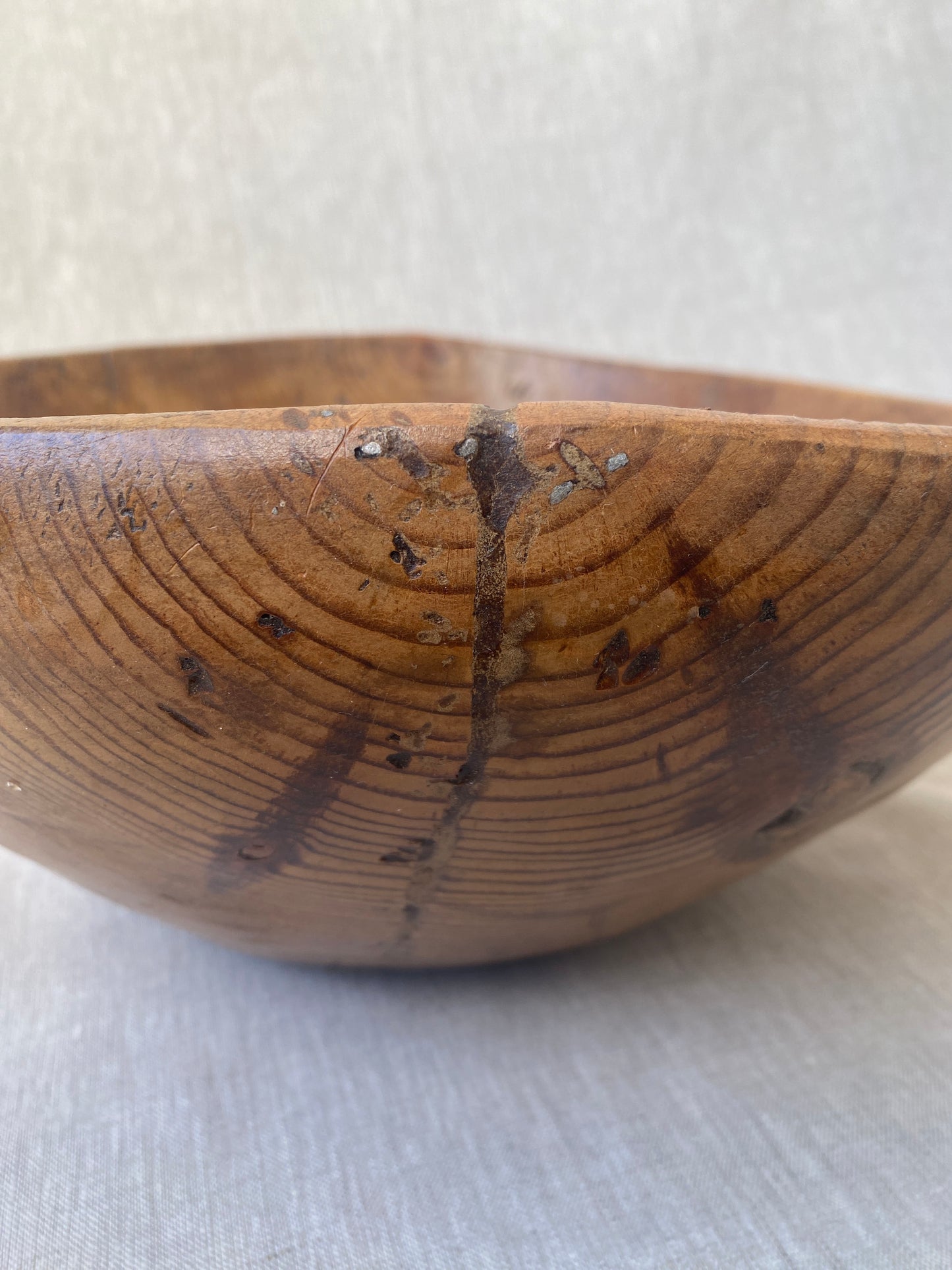 a wabi sabi style antique wooden dough bowl with an organic feel and pretty patina