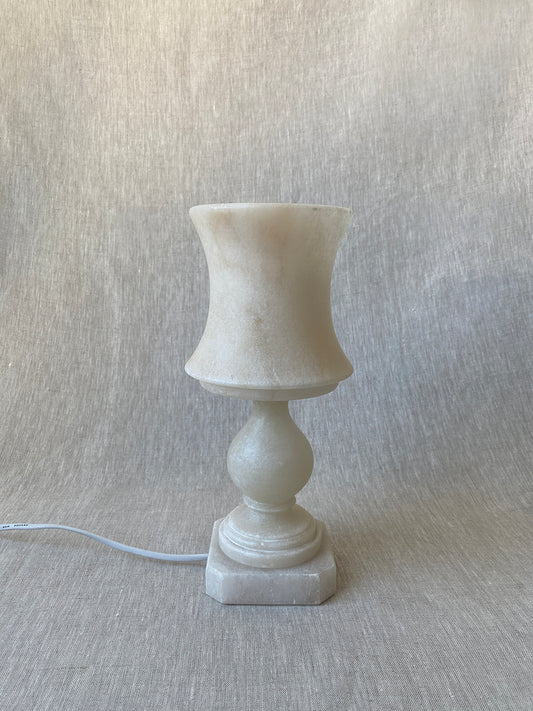 a small vintage Italian-inspired white marble lamp 