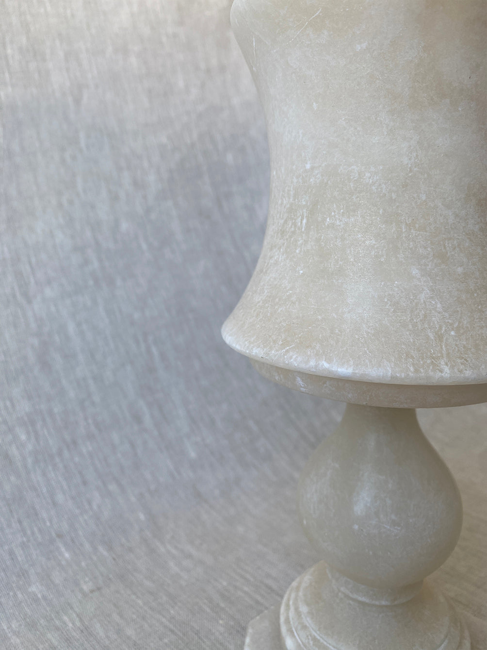 a small vintage Italian-inspired white marble lamp 