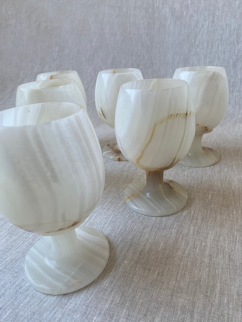 a set of vintage onyx goblets in natural stone marble