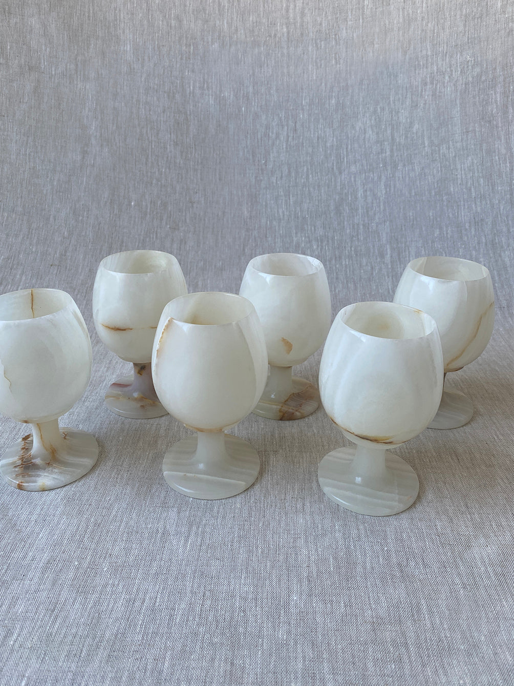 a set of vintage onyx goblets in natural stone marble